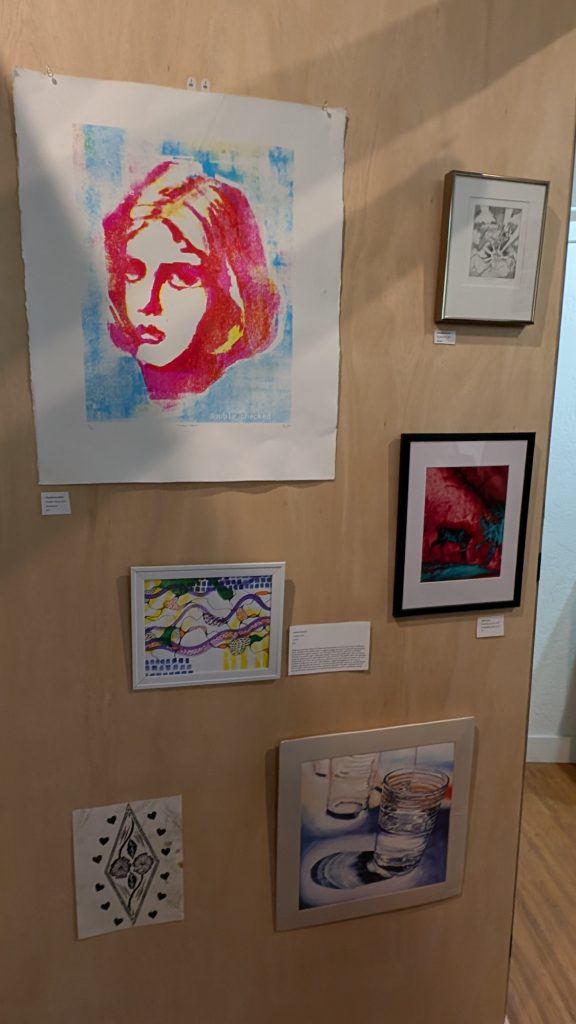 Art on display during the "Got Me Gagged" night of music and art at Stokes Nature Center