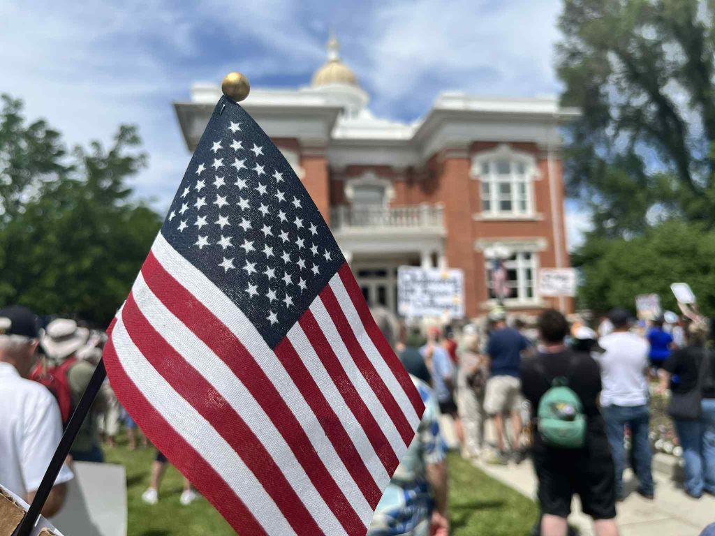 Protesters rally against government overreach at the Historic Cache County Courthouse.