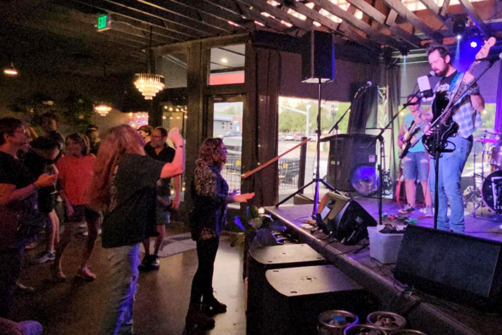 Local band Open Door Policy plays at The Cache Bar in Logan in July 2024
